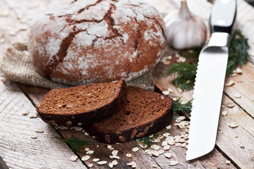 Bread, garlic, dill and knife