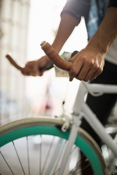 Bike mechanic checking at bicycle