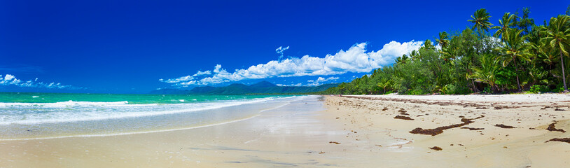 Port Douglas four mile beach and ocean on sunny day, Queensland,