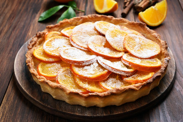 Fruit pie with orange caramelized slices