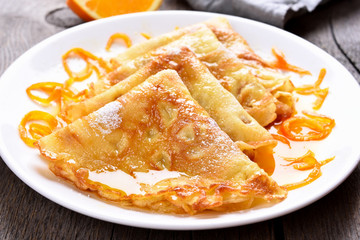 Delicious crepes with orange syrup