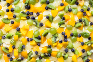 Colorful fruit background texture from fruit slices