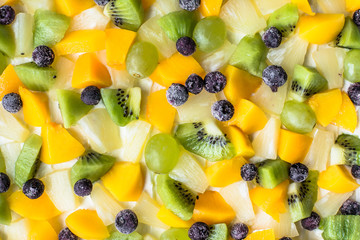 Colorful fruit background texture from fruit slices