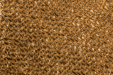 Closeup of a gold metallic surface