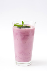 Fresh blueberry smoothie on white background
