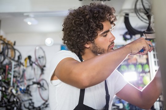Worker repairing bicycles