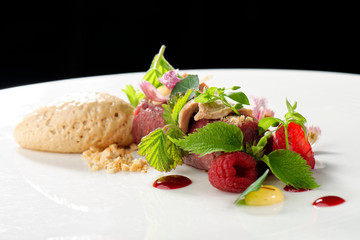 Fine dining, tuna fillet tartare with raspberryes