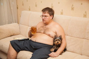 fat man drinking beer
