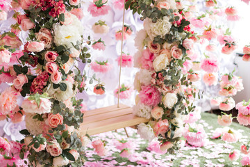 The swing decorated with flowers