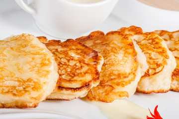 Pancakes on white plate