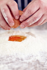 Close up of chef making pizza dough 