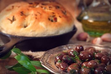 Italian Focaccia bread with rosemary and black olives