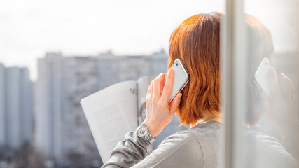 Fototapeta premium Woman talking on the mobile phone