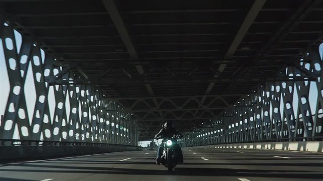 Motorcycle On The City Bridge
