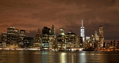 Plakat New York City skyline by night, USA