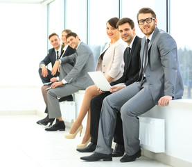 Business Team Having Informal Meeting In Office