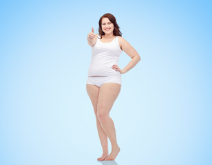 Fototapeta premium plus size woman in underwear showing thumbs up