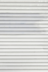 Obraz premium White horizontal roller shutter blinds