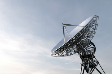 Satellite dishes connection communication in the sky and the morning sun