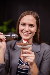 Pretty woman about to eat dessert