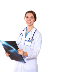 Happy smiling young beautiful female doctor showing blank area for sign or copyspace, isolated over white background