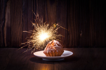 Cupcake and burning sparkler