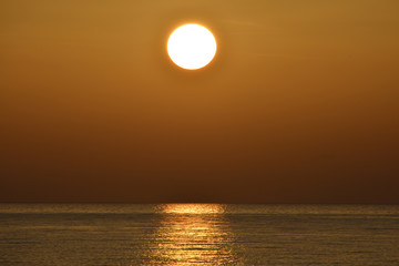 Fototapeta na wymiar Sunset above horizon
