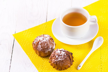 tea cup and muffins