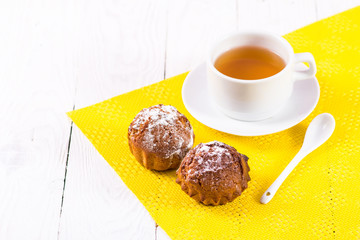 tea cup and muffins