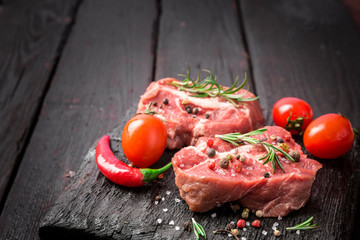 raw beef steak and spices
