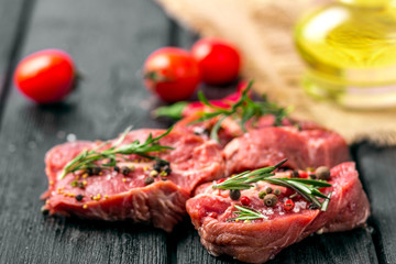 raw beef steak and spices