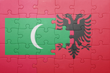 puzzle with the national flag of maldives and albania