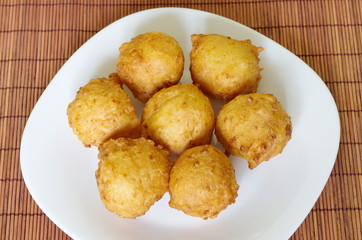 Homemade cottage cheese donuts on a plate