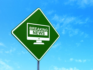 News concept: Breaking News On Screen on road sign background