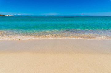 Fototapeta na wymiar Beautiful sand beach with turquoise water
