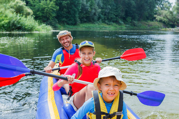 Family kayaking on the river - 108147827