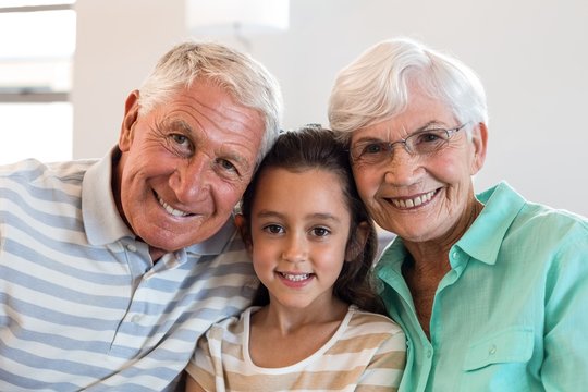 Grandmother And Grand Father With Their Granddaughter