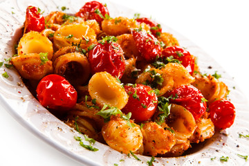 Orecchiette pasta, tomato sauce and vegetables
