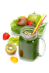 Green smoothies and ingredients on a white background