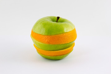 Mixed apple and orange isolated on white background concept