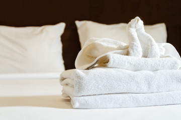 Fototapeta na wymiar elephant shaped towels on the bed
