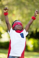 Young child dressing up as a hero - obrazy, fototapety, plakaty