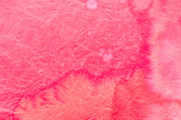 Fototapeta premium red painted paper tissue background