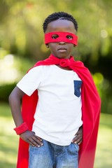 Young child dressing up as a hero - obrazy, fototapety, plakaty