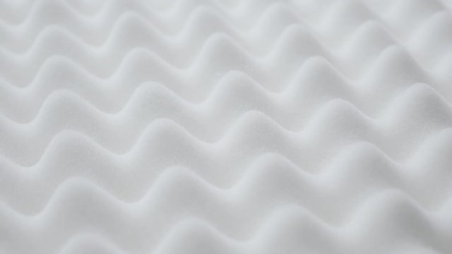 Modern mattress foam peak and valley surface design slow tilt 4K 2160p 30fps UltraHD video - Orthopedic exaggerated peak and valley design memory foam mattress texture tilting 4K 3840X2160 UHD 
