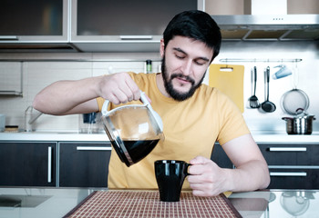 Bearded man in the kitchen