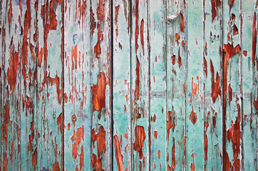 Wooden green painted fence as grunge background
