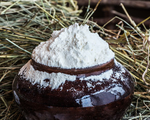Flour in clay pot.
