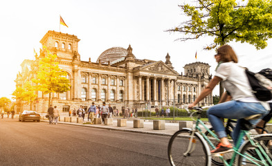 Berlin urban city life with Reichstag at sunset in summer, Germany