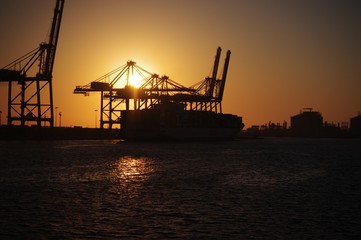 Fototapeta na wymiar Sunset at container terminal